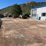 a building with red lines on the ground