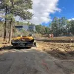 a construction vehicle on a dirt road